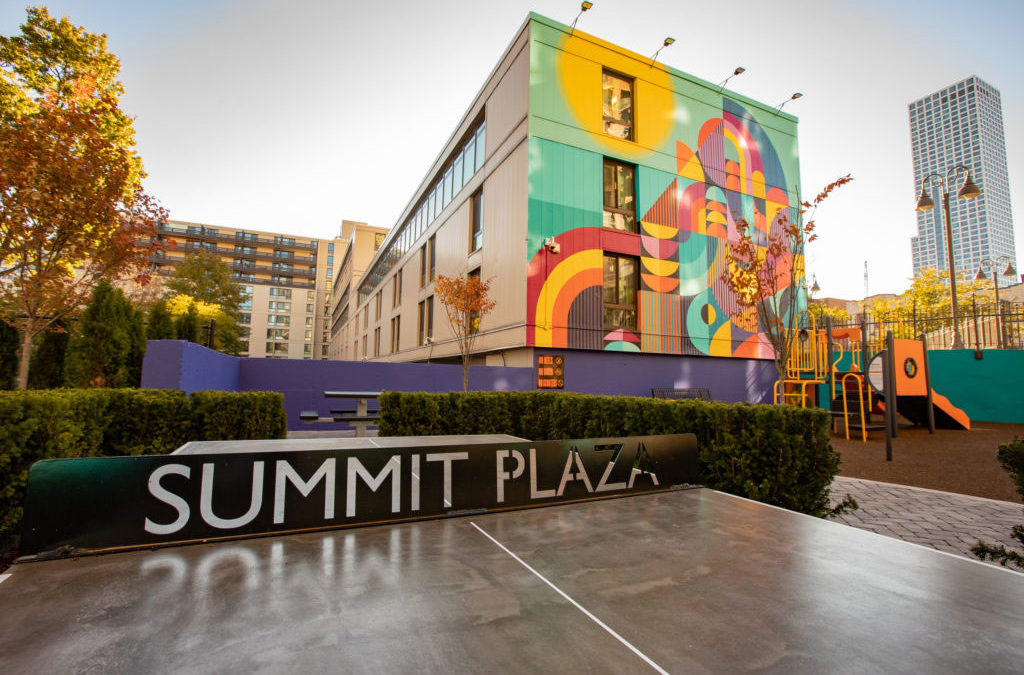 Summit Plaza ribbon cutting ceremony celebrating over $18M in renovations